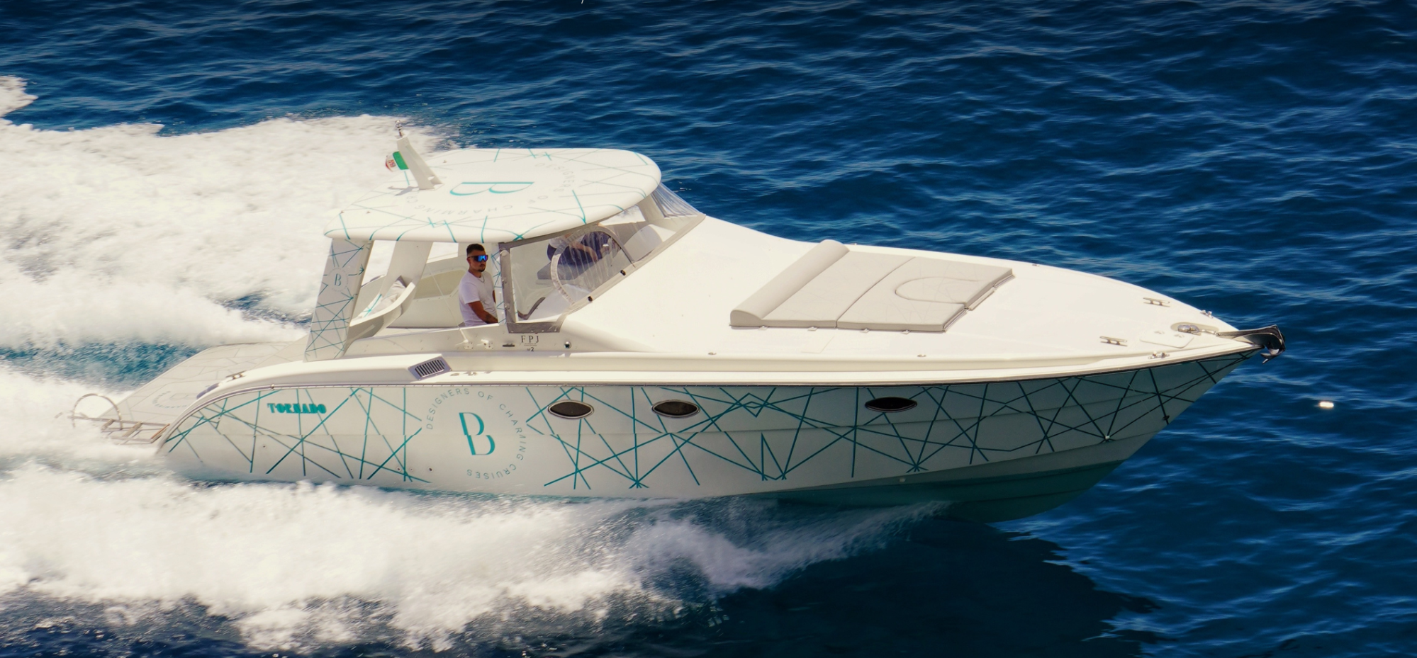 Boat cruising on blue ocean waves with text about Salerno and Amalfi Coast.